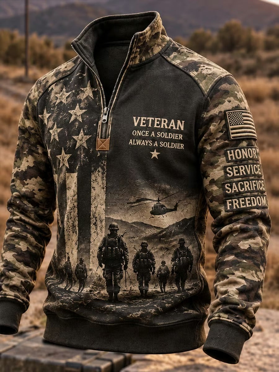 Men's Veterans Day half zip pullover with black and brown camo sleeves, American flag and soldier artwork