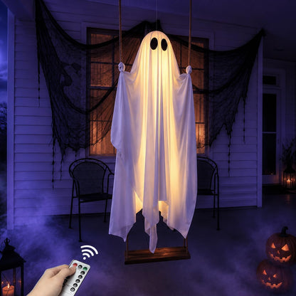 5ft swinging ghost Halloween decoration glowing on porch at night