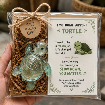 Recycled glass support turtle in Made-with-Care gift box with story card