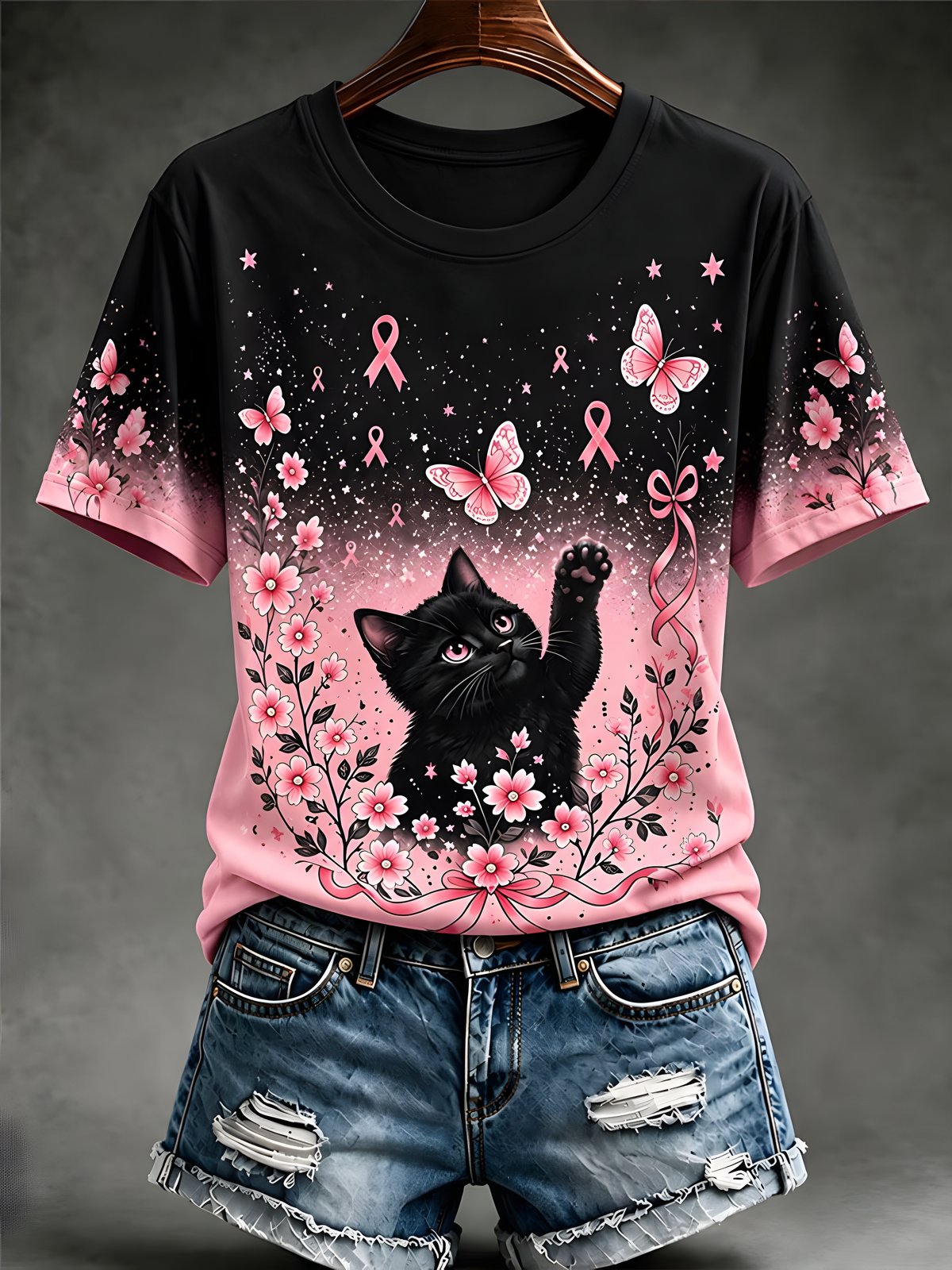 Pink and black breast cancer awareness T-shirt with a black cat, pink butterflies, flowers and ribbon motifs