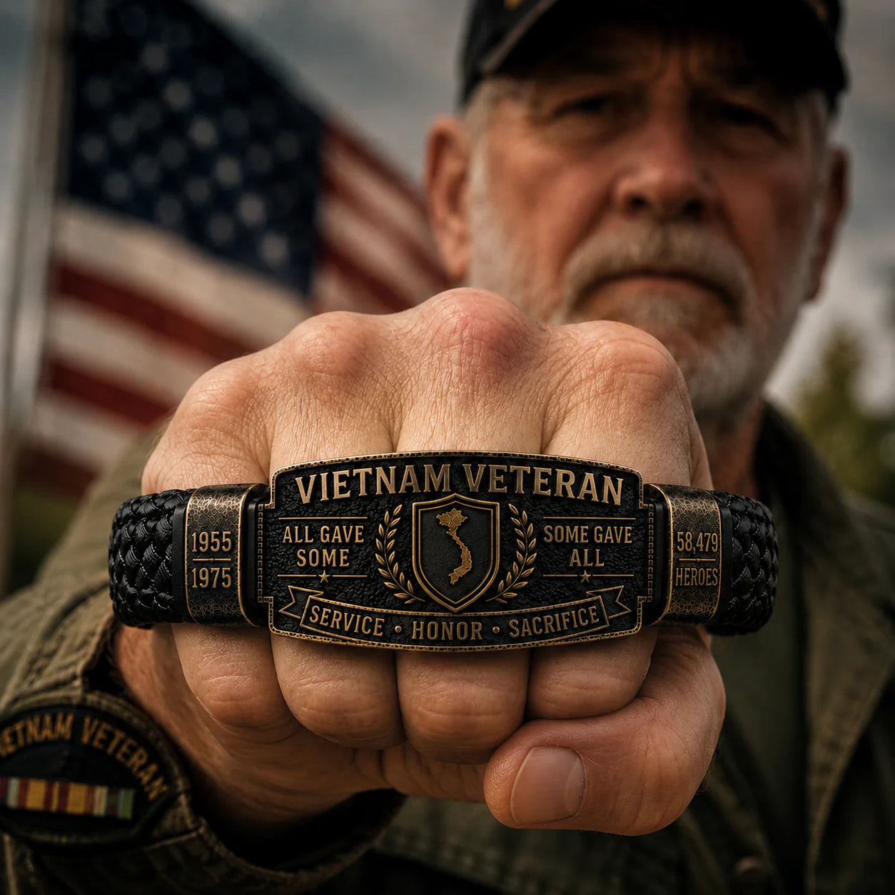 Vietnam veteran wearing bracelet with American flag background