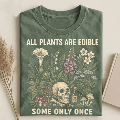All Plants Are Edible botanical skull T-shirt sage green with mushrooms and wildflower illustration