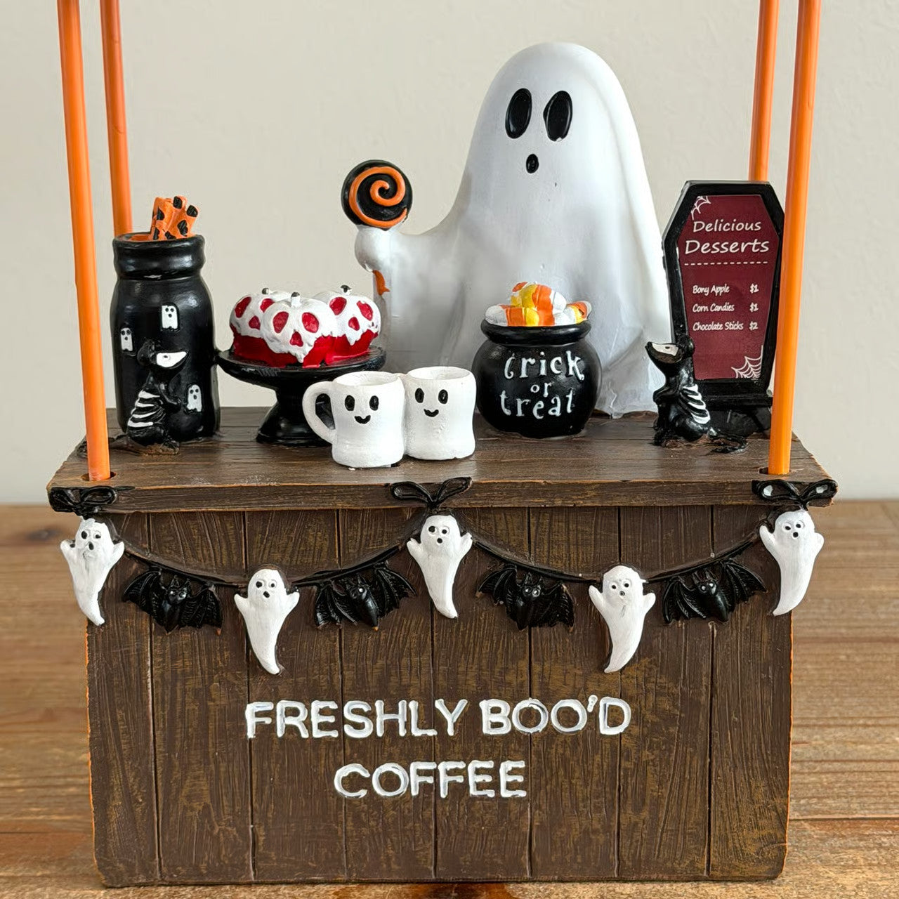 Halloween ghost coffee cart with candy jars and chalkboard menu
