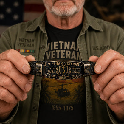 Veteran holding Vietnam Veteran Honor Bracelet with US Army flag