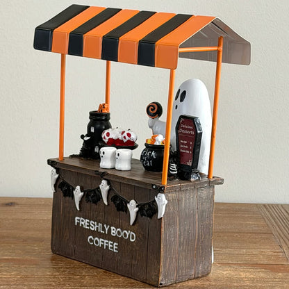 Orange and black striped awning Halloween ghost coffee cart