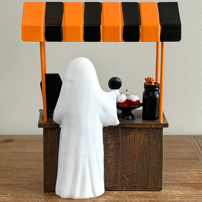 Back view of Freshly Boo'd Coffee ghost barista working at stand