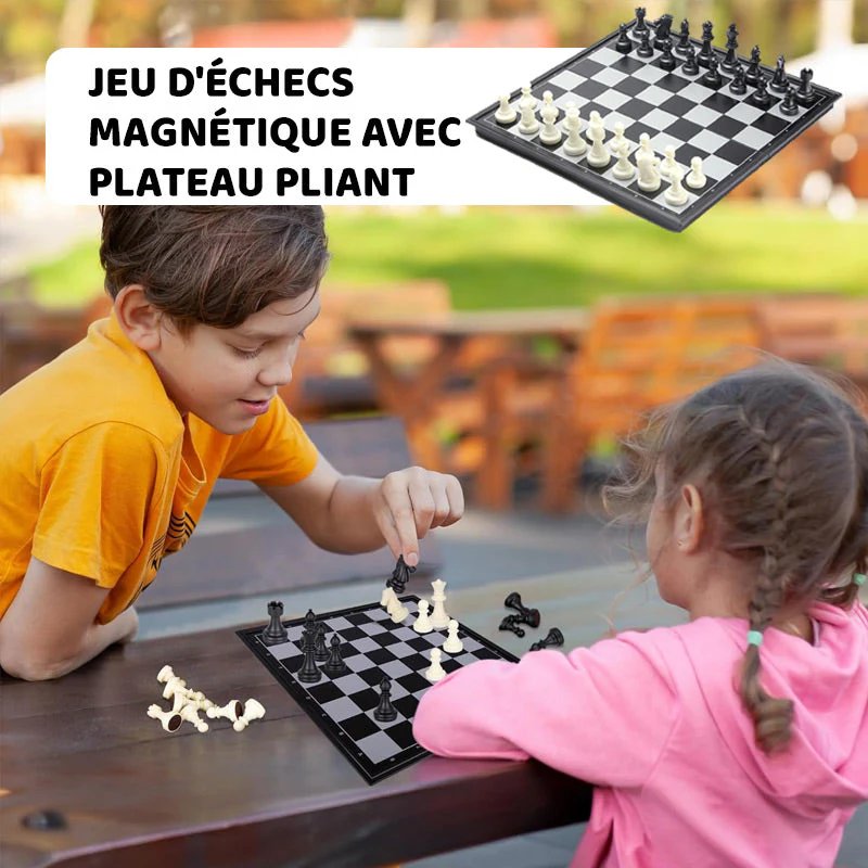 Two children playing chess outdoors on a wooden table