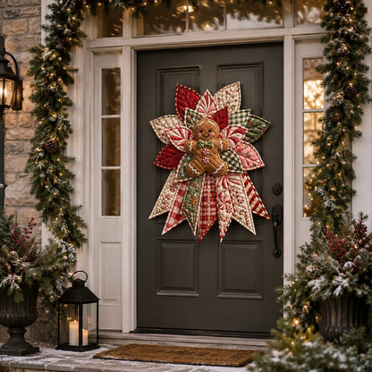 Peppermint gingerbread quilted door hanging on dark gray door at dusk