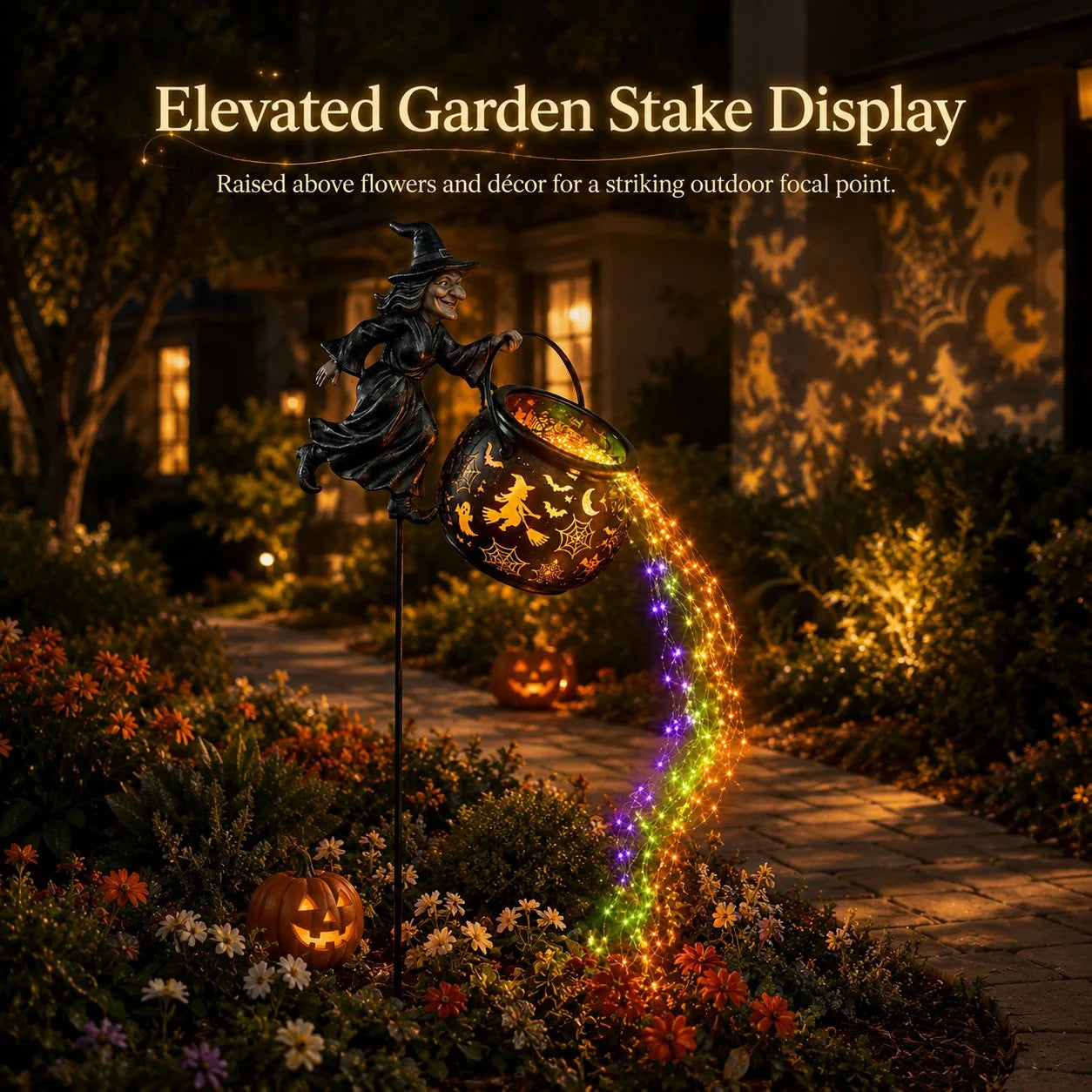 Elevated garden stake display for Halloween witch cauldron light