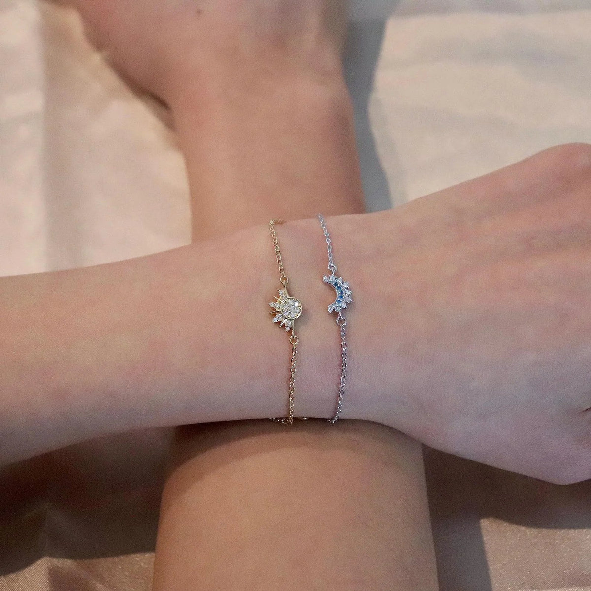 Sun and moon bracelets worn side by side for everyday styling