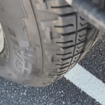 Sealed tire driving smoothly on the road after repair