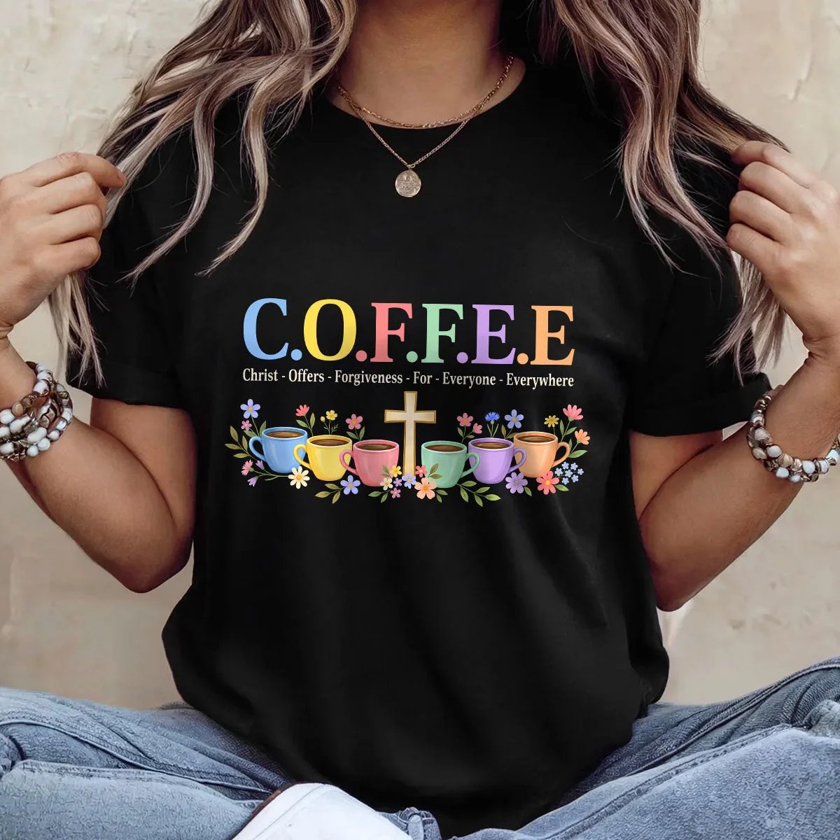 Black Christian coffee graphic unisex T-shirt styled with jeans