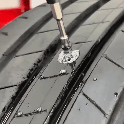 Electric driver installing rubber nail into tire