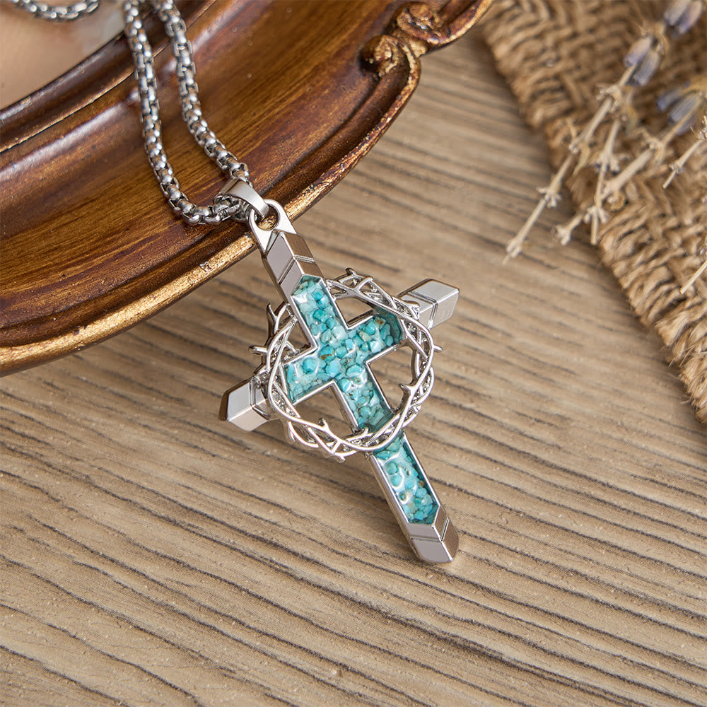 Christian cross necklace in polished silver with turquoise stone inlay and thorn crown