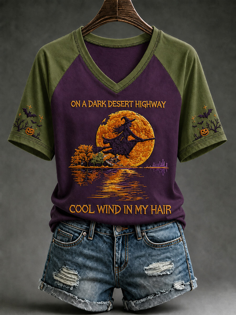 Women's Halloween witch pumpkin V-neck tee in purple with olive raglan sleeves