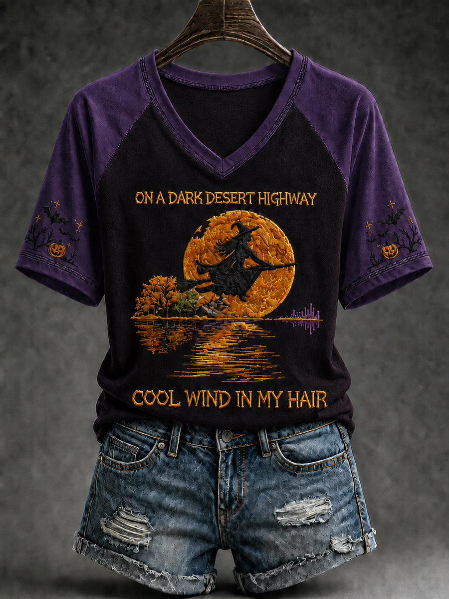 Women's Halloween witch pumpkin V-neck tee in black with contrast sleeves