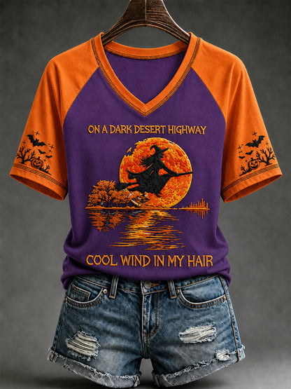 Women's Halloween witch pumpkin V-neck tee in light purple with orange sleeves