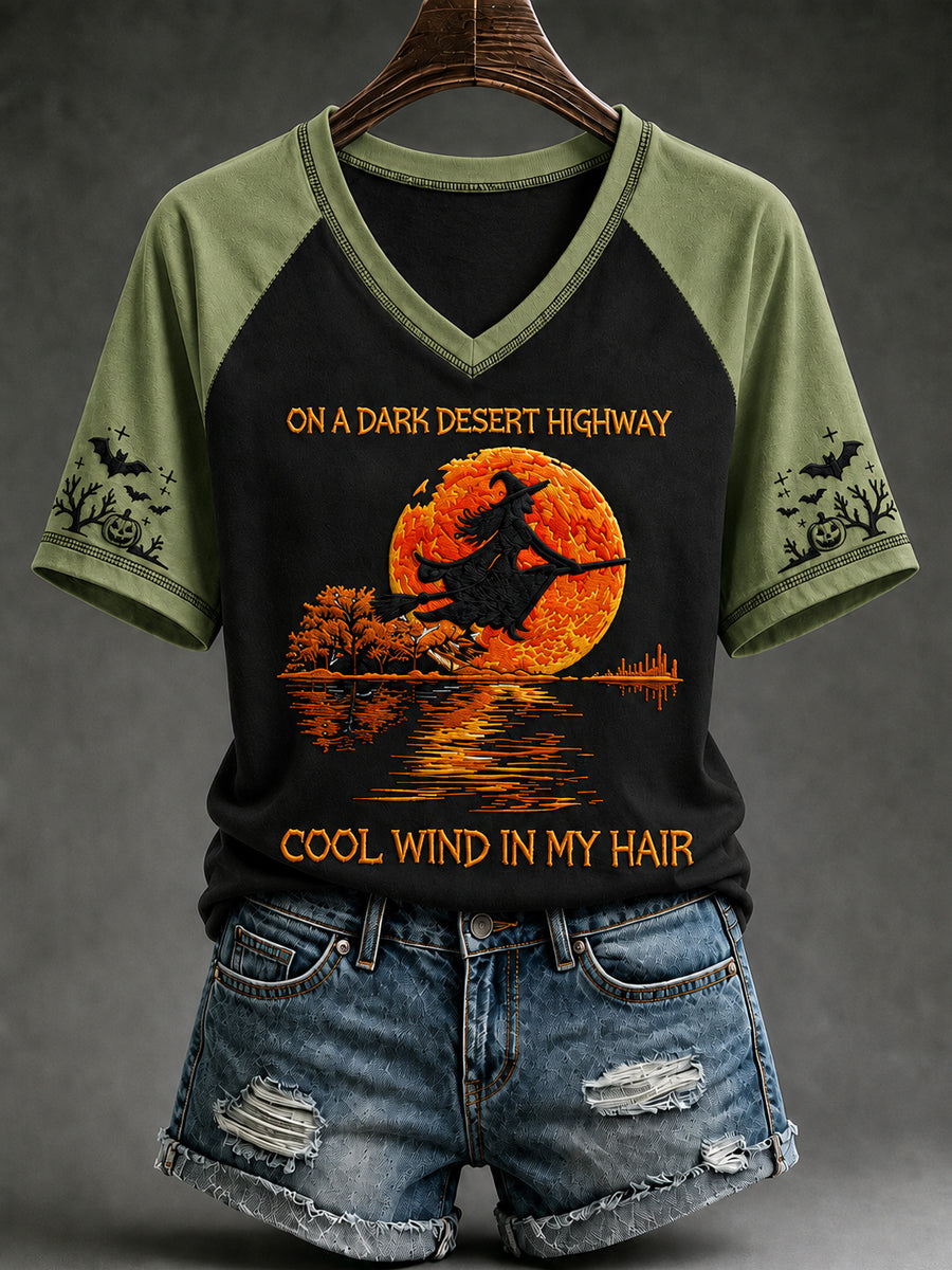 Women's Halloween witch pumpkin V-neck tee in light green with sage raglan sleeves