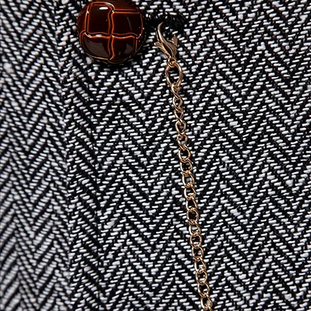 Men's Gray herringbone waistcoat fabric and chain close-up