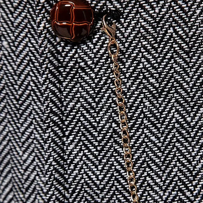 Men's Gray herringbone waistcoat fabric and chain close-up