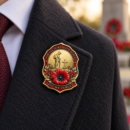 Gold-tone red poppy remembrance brooch worn on a dark coat lapel