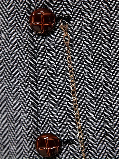 Men's tweed waistcoat button row and chain close-up