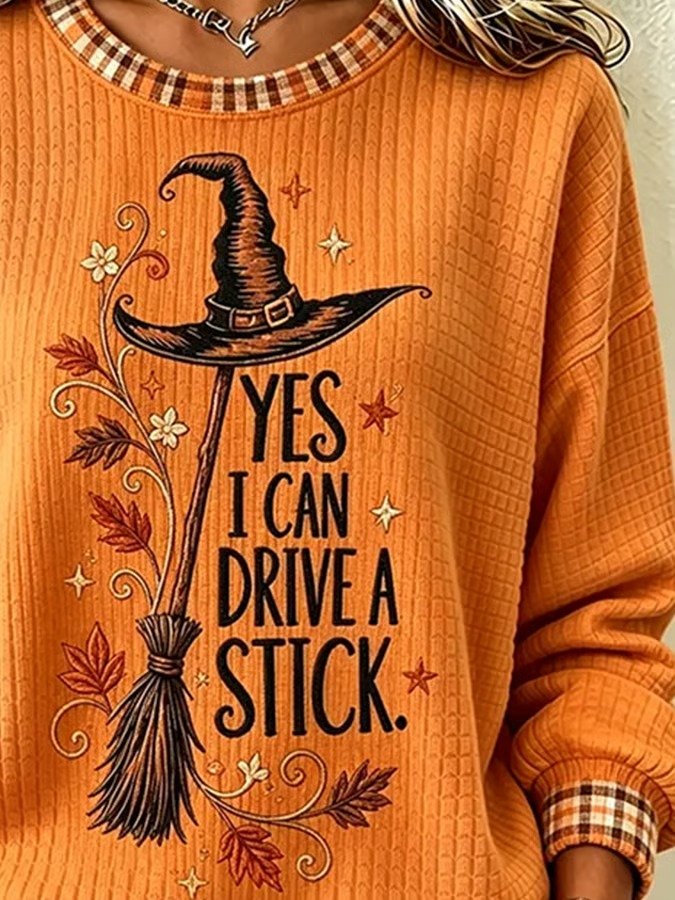 Women's Halloween sweatshirt with plaid neckline and witch graphic detail