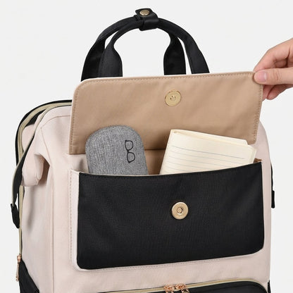 Front flap pocket of the lunch backpack holding glasses and a notebook