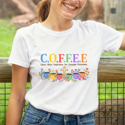 White Christian coffee graphic unisex T-shirt worn outdoors with denim