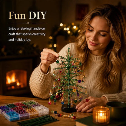 Woman relaxing by the fireplace assembling the DIY beaded Christmas tree