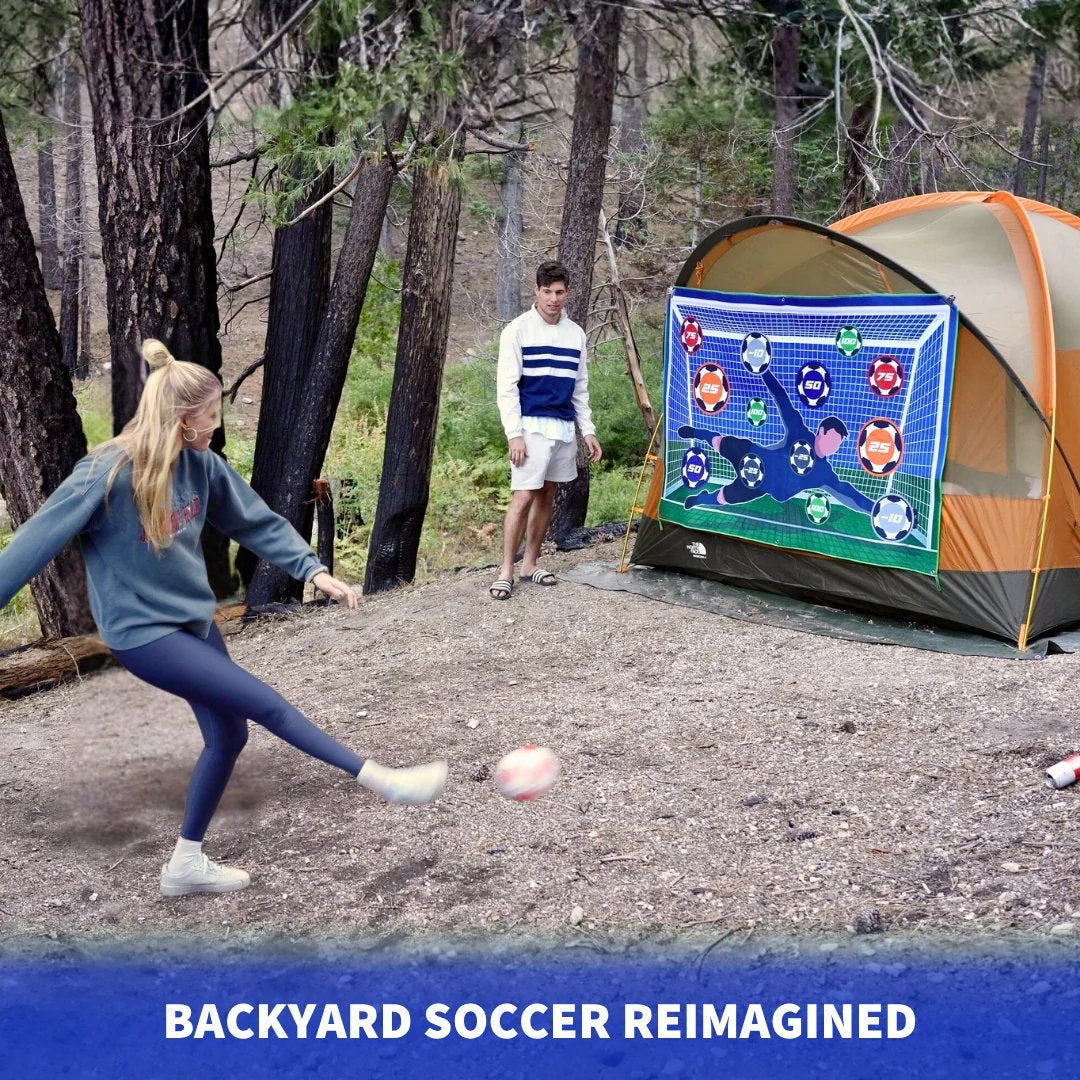Soccer target mat hung on the side of a tent at a campsite