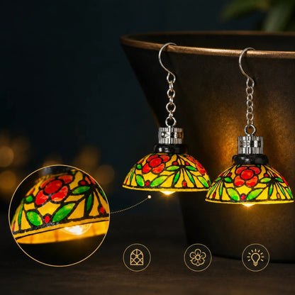 Vintage stained-glass chandelier earrings design close-up with feature icons