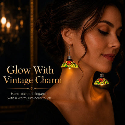 Model wearing glowing vintage chandelier earring with warm luminous finish