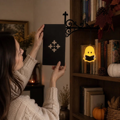 Ghost bookshelf lantern clipped onto shelf with no tools