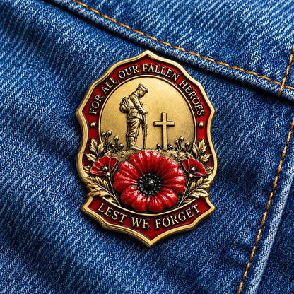 Gold-tone red poppy remembrance brooch pinned to blue denim