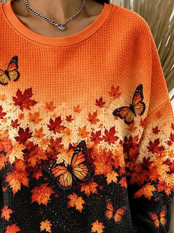 Autumn leaf and butterfly sweatshirt neckline and textured chest detail