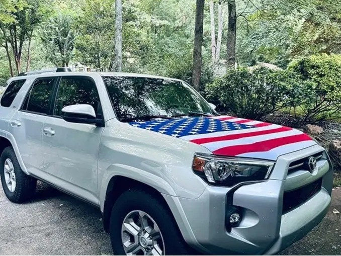 American flag hood cover on SUV outdoor real photo