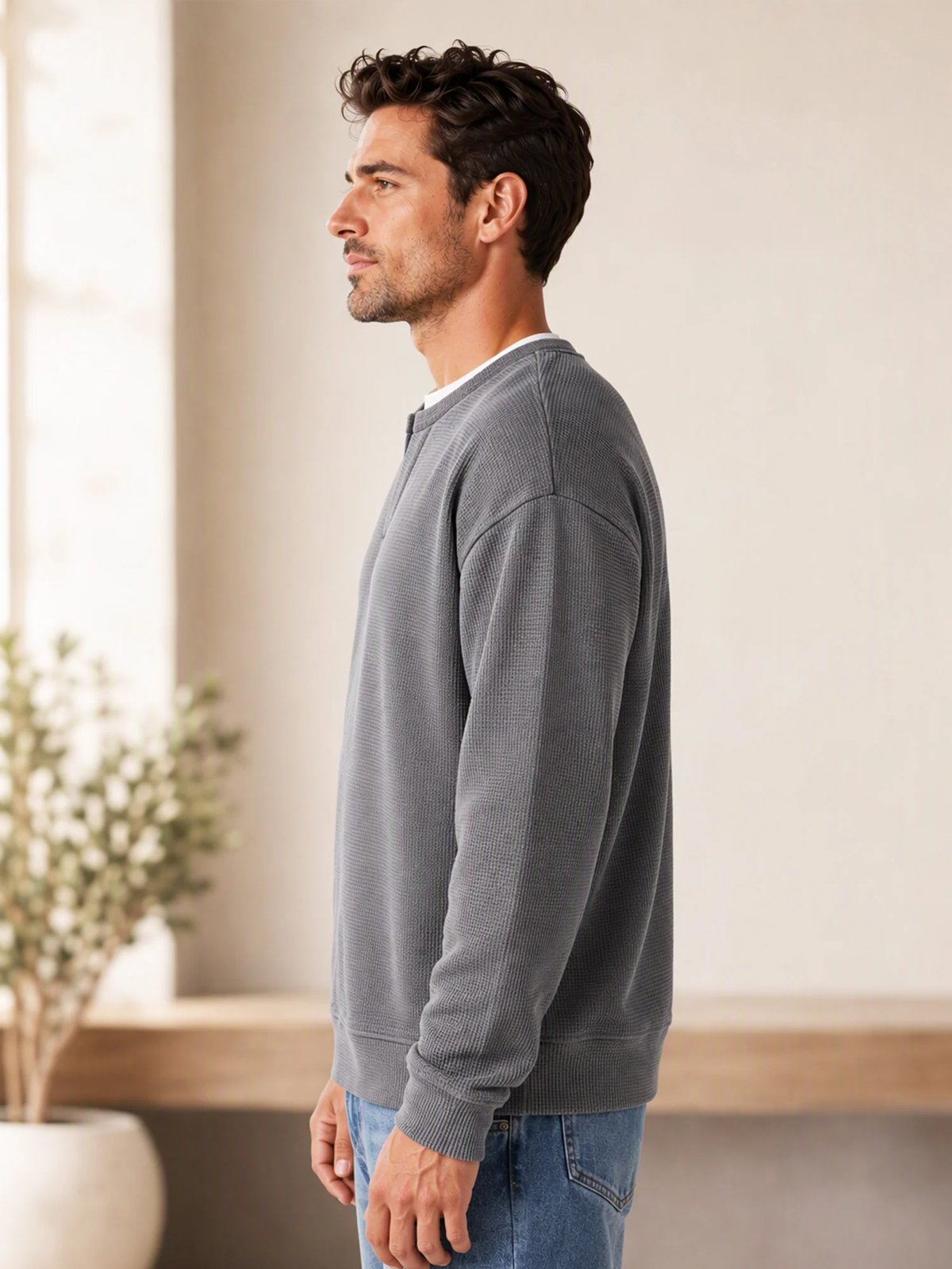Side view of relaxed grey men's long sleeve waffle tee