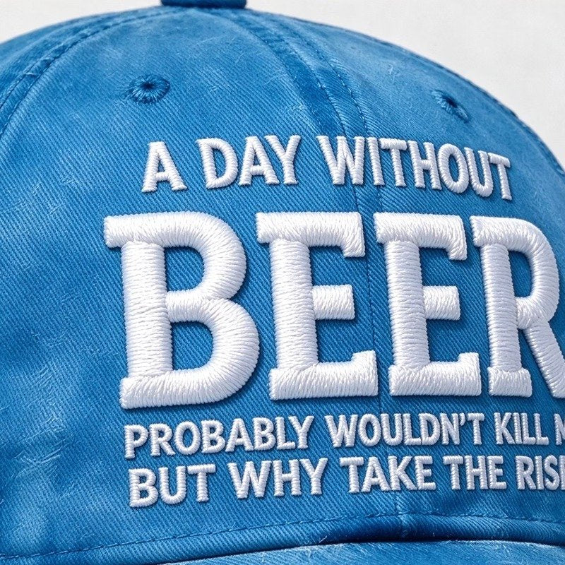 Close-up of raised embroidery on the blue Why Take the Risk beer hat