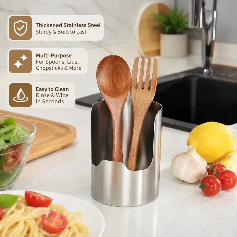 Stainless steel utensil organizer holding spoons beside a kitchen sink