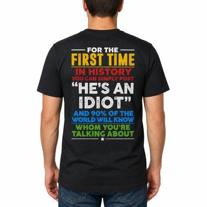 He's an Idiot graphic T-shirt with colorful back print worn with jeans