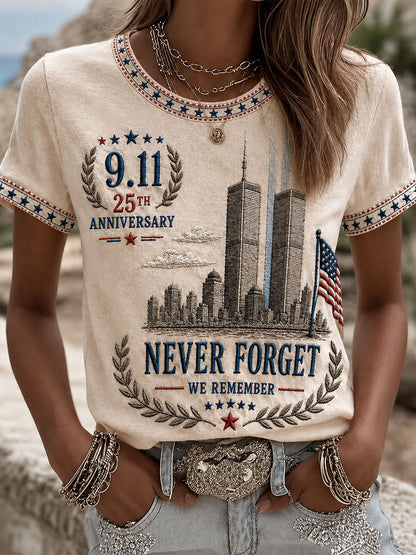 Women's 9/11 25th Anniversary Never Forget T-Shirt in Apricot with Twin Towers memorial print