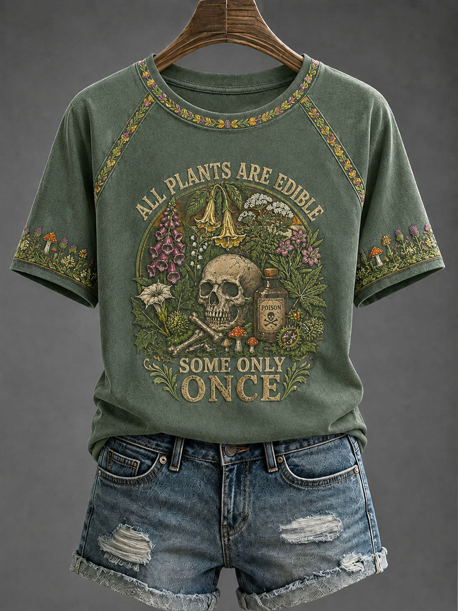 Women's Green raglan tee with vintage botanical skull print, front view