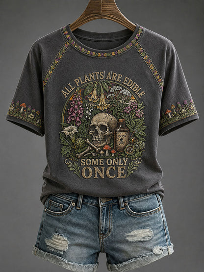 Women's Dark Gray raglan tee with botanical skull print featuring wildflowers and mushrooms