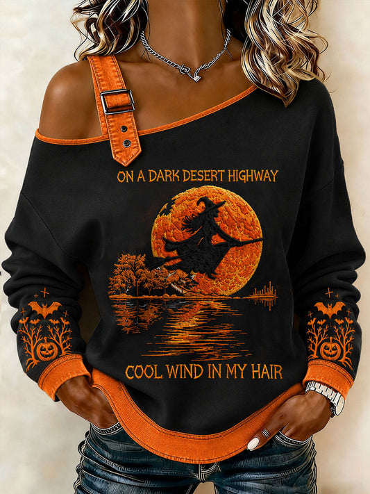 Black off-shoulder Halloween witch pumpkin sweatshirt for women with orange cuffs